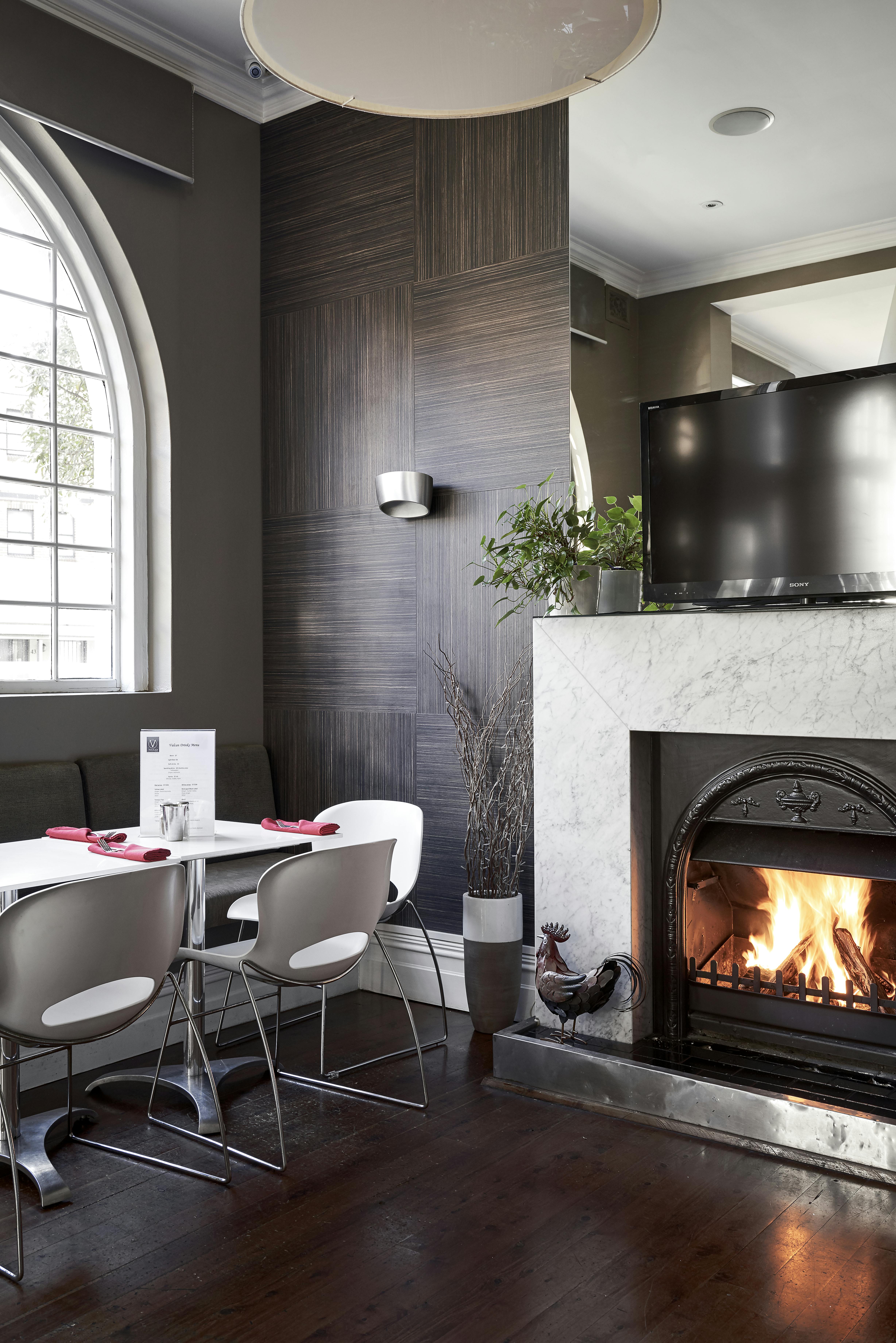 ultimo cafe with fireplace at vulcan hotel